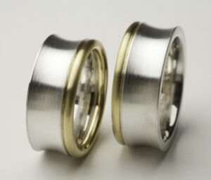 Trauringe bicolor. Silber und 750/- Gelbgold